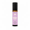 A 10ml amber glass roll-on bottle with a black cap and a lavender purple label that reads 'Anxiety sucks' by the brand 'the wilde magnolia'.