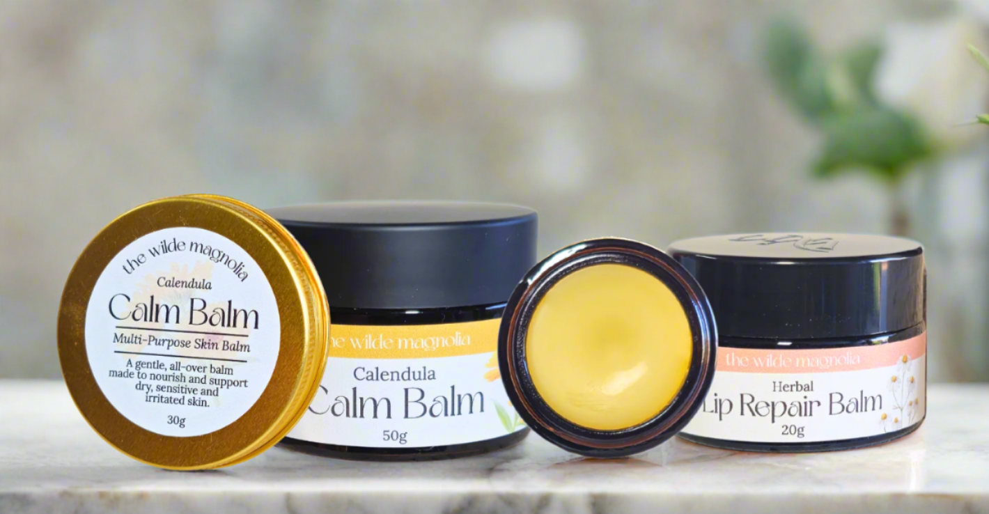 2 natural calendula skin healing balms and a natural herbal lip balm