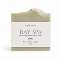 A single rectangular botanical cleansing bar wrapped in a white paper label reading 'the wilde magnolia DAY SPA White Sage | Ylang Ylang | Litsea Fresh Botanical Cleansing Bar 120g', photographed on a clean white background.