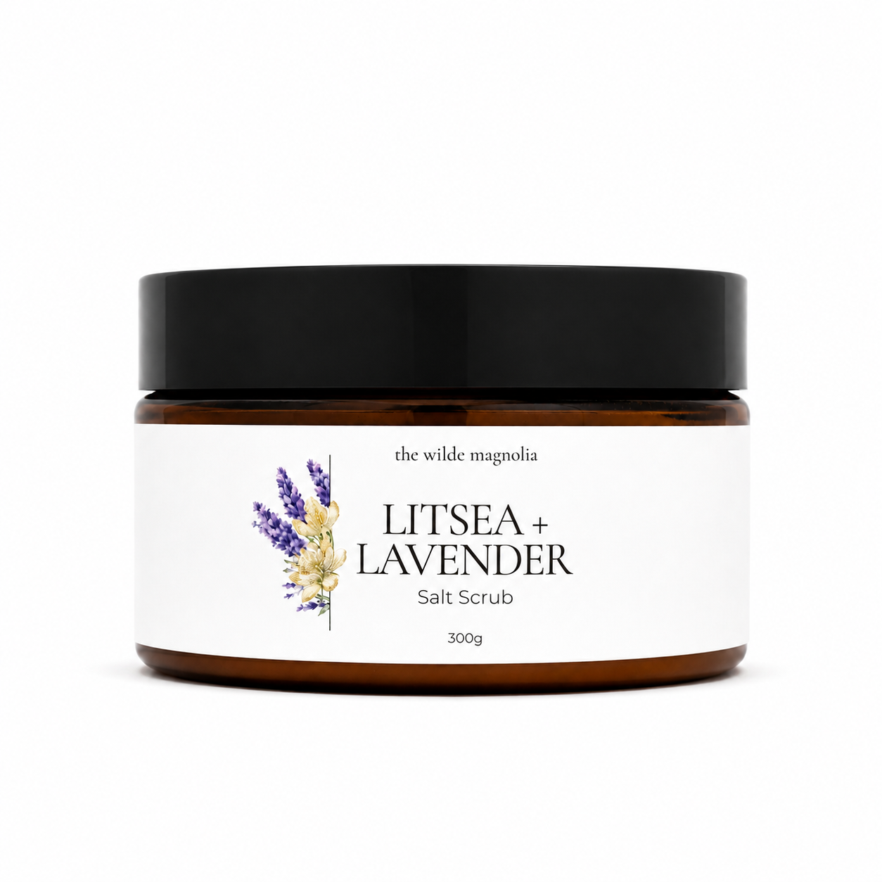 A 300g jar of 'Litsea + Lavender' salt scrub by 'The Wilde Magnolia'. The product is in an amber glass jar with a black lid and a white label featuring purple and yellow lavender illustrations.