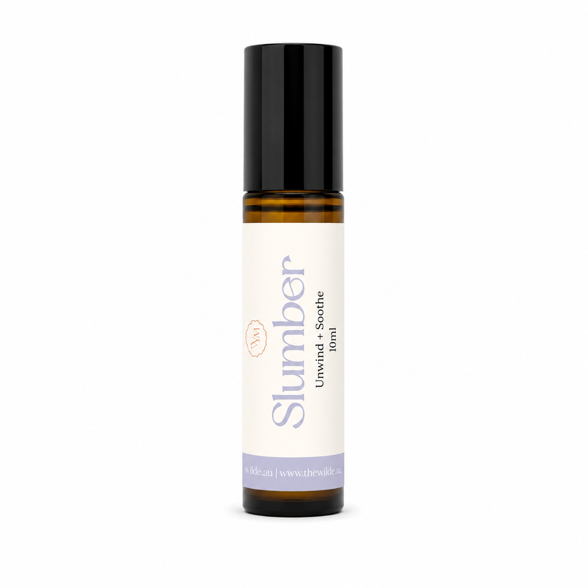 A 10ml amber glass roller bottle of 'Slumber' Unwind + Soothe essential oil from 'the wilde magnolia' with a black cap and a cream-colored label, shown on a plain white background.